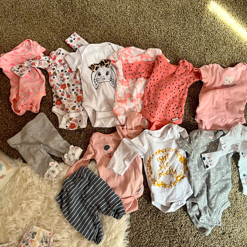 36 newborn onesies 5 newborn pants , 1 newborn sleep sac, 17 newborn sleepers.
